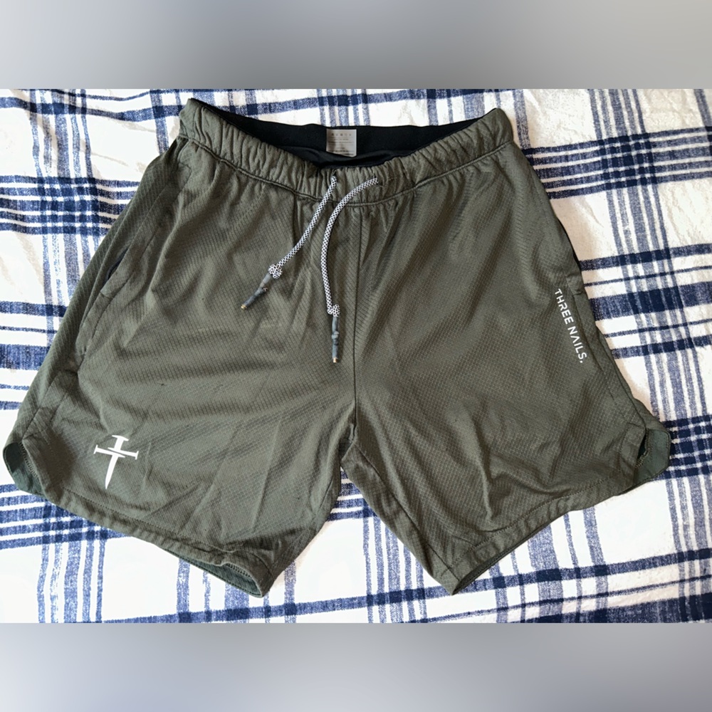 Small green compression lined gym shorts